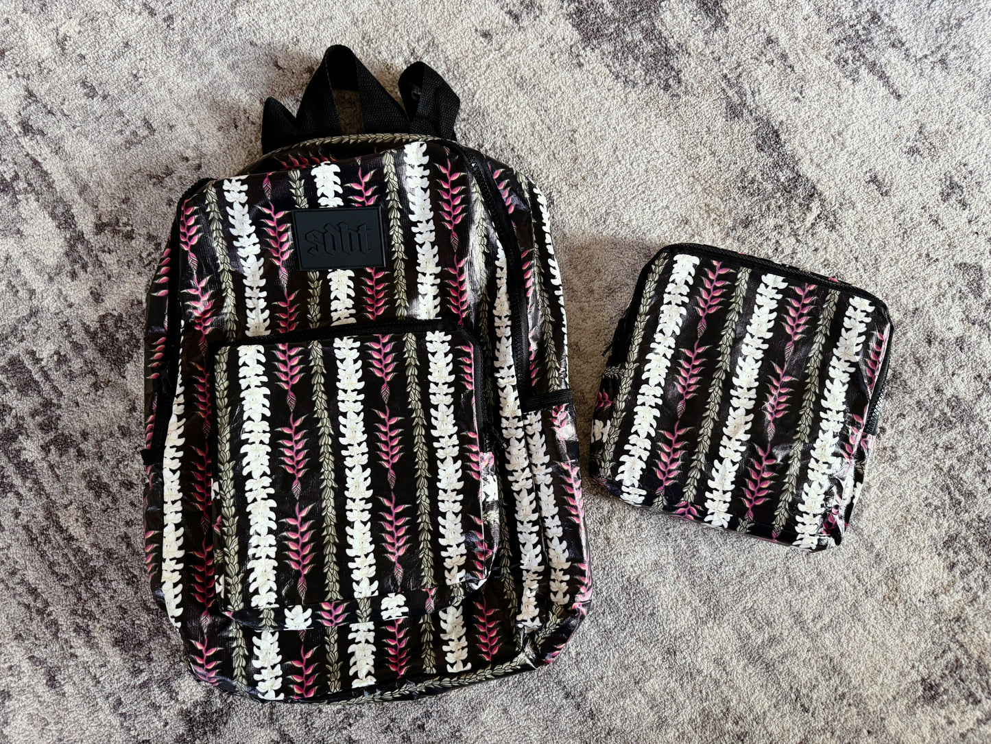 Foldable Backpack - Black Heliconia Plumeria Pikake